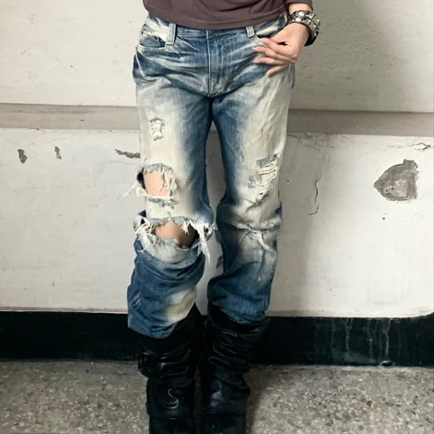 Distressed light denim pants