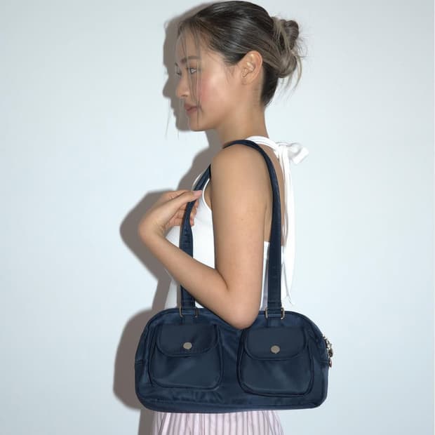 큘 포켓백 네이비