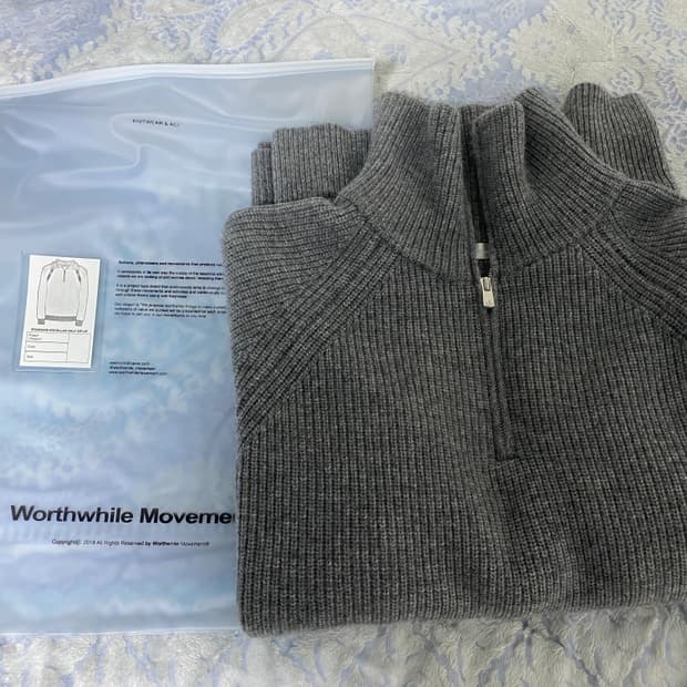 월스와일무브먼트 하프집업