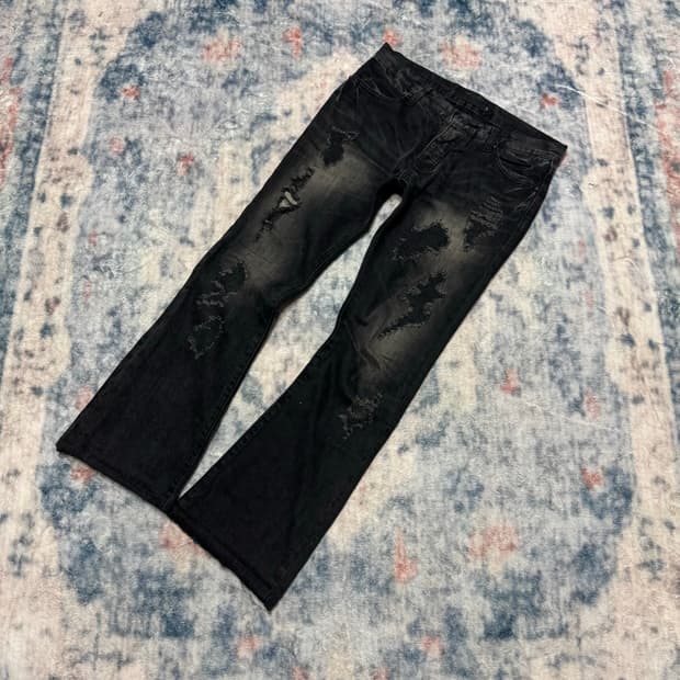 Fuga 00s archive black distressed boots 
