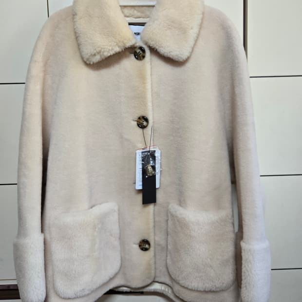 칼라거펠트 양모100%무스탕 코트(66사이즈)