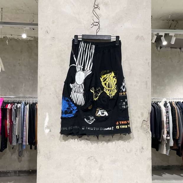 버나드 윌헴 블랙 미스 키티+E 패치 밴딩 미디스커트