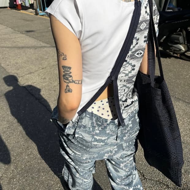 0tape detail jacquard pants