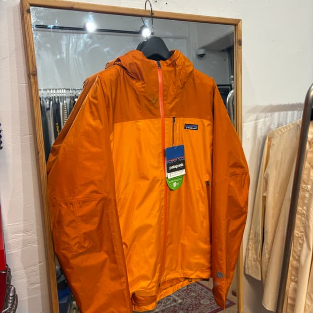파타고니아 오렌지 그라데이션 나노 스톰 자켓