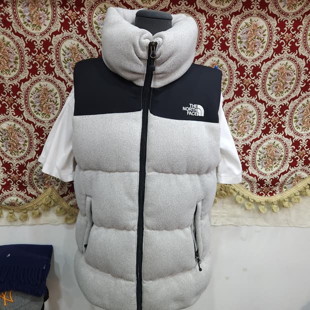 노스페이스 블룸 구스 패딩조끼

