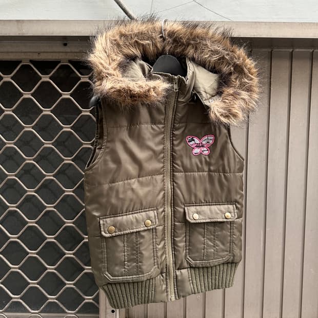 Butterfly patch fur vest