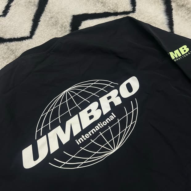 [L]엄브로 빅로고 립스탑 라운드 웜업/블랙