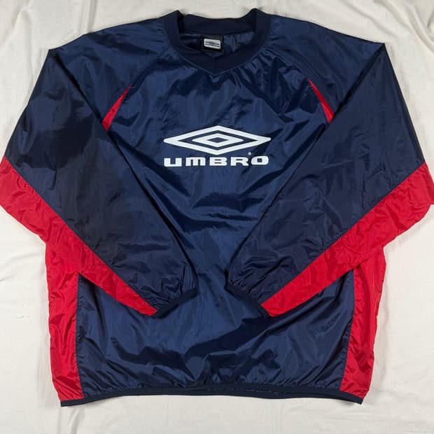 엄브로 바람막이 웜업 피스테