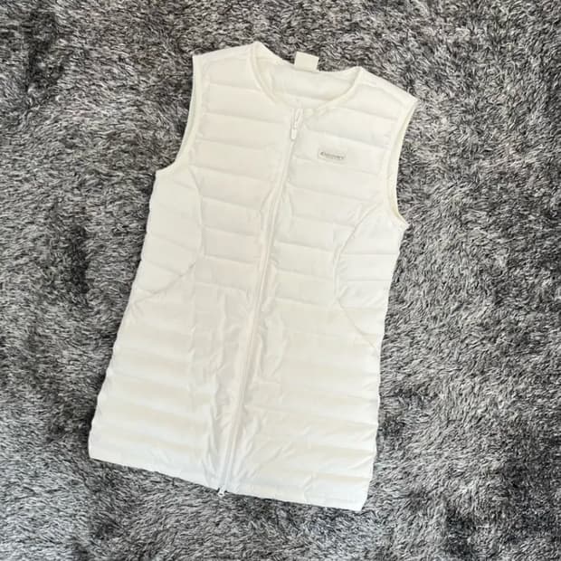 디스커버리 여성 거위털 패딩 롱베스트 (95)