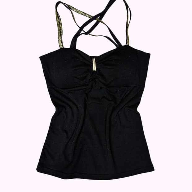 cross string cubic buckle top