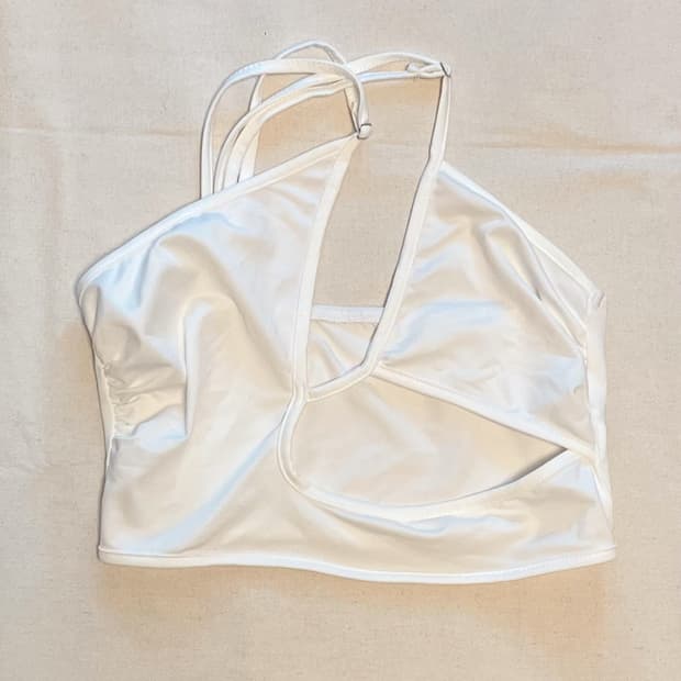 white cut-out sleeveless top