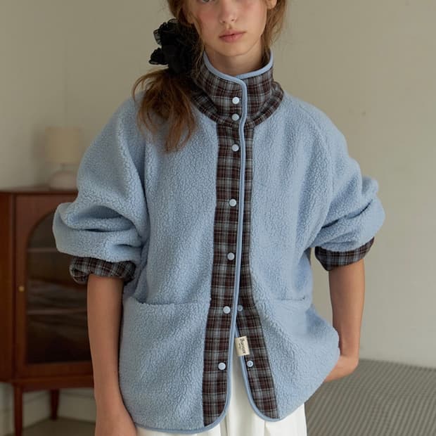 A CHECK FLEECE REVERSIBLE JUMPER