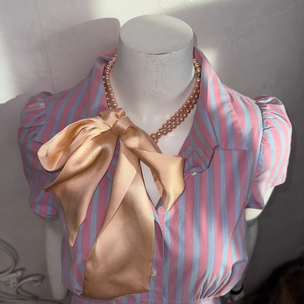 Coral champagne pearl ribbon necklace