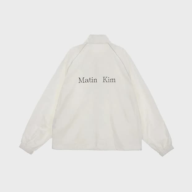 MATIN KIM LOGO COATING JUMPER IN WHITE