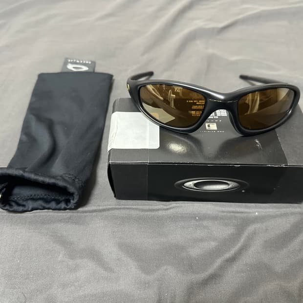 오클리 스트레이트자켓 골드 이리듐