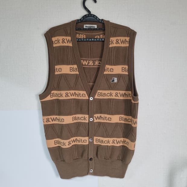 블랙앤화이트 민소매 자켓