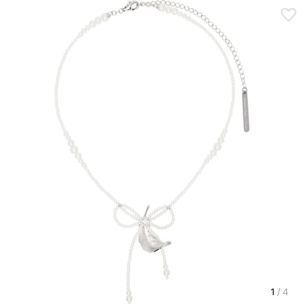 슈슈통 위민 에디션 태슬 깃털 목걸이