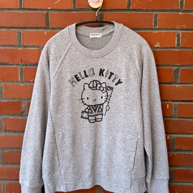 산리오 헬로키티 엔지니어 라글란 맨투맨