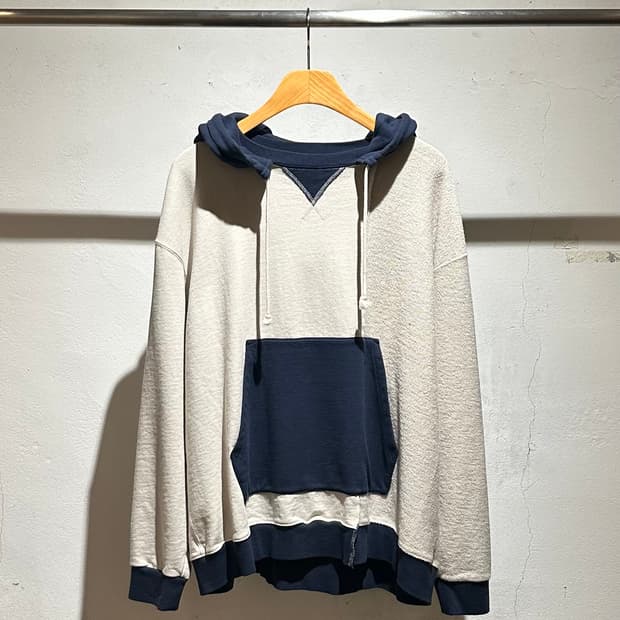 Name. Asymmetric Switching Hoodie