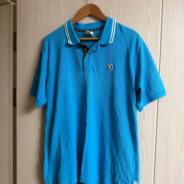 베이프(AAPE) 원포인트 로고 PK 카라 반팔티 (스카이블루)