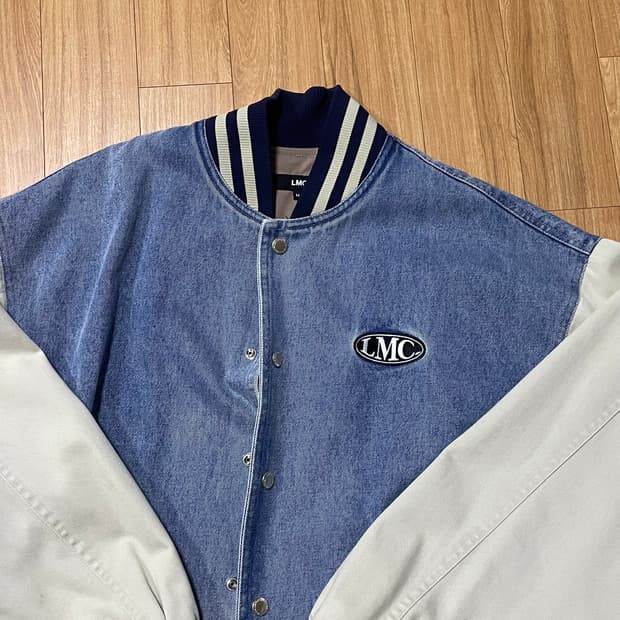 lmc 엘엠씨 오발 워시드 베이스볼 바시티 데님 자켓