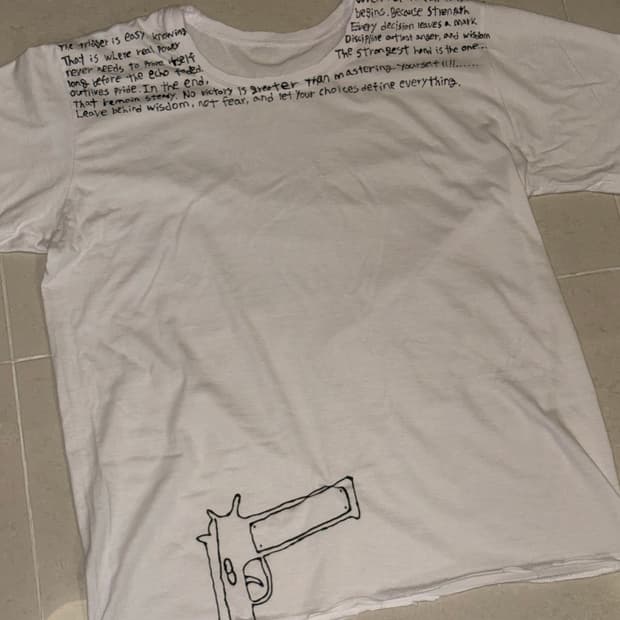 Custom lettering and gun T-shirts