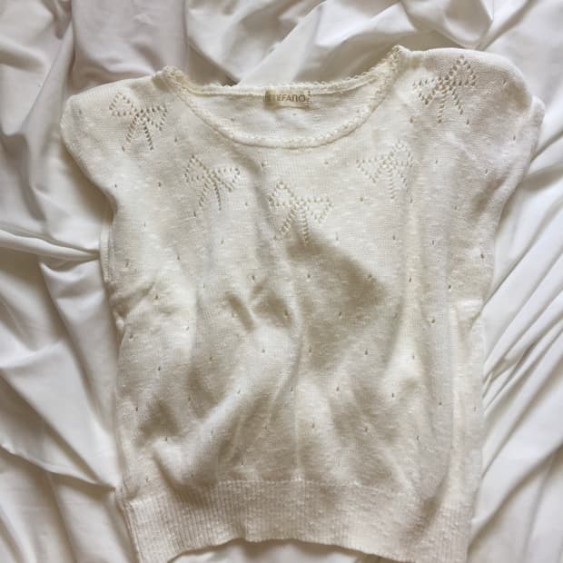 리본 펀칭 반팔니트