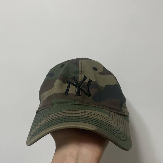디스이즈네버댓X뉴에라 카모 모자