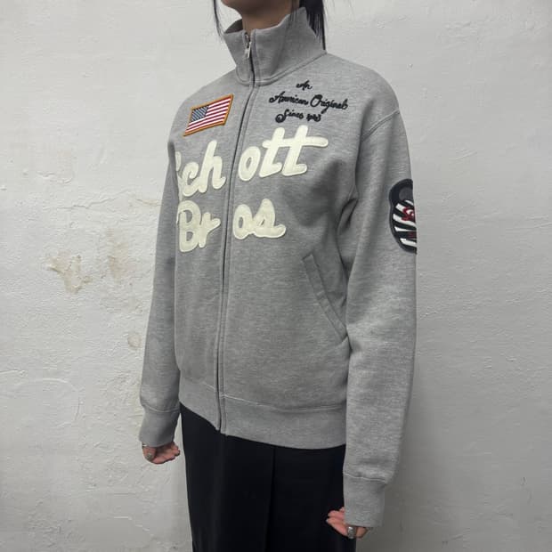 쇼트(Schott) 멜란지 자수 패치로고 폴리에스터 하이넥 트랙탑 자켓