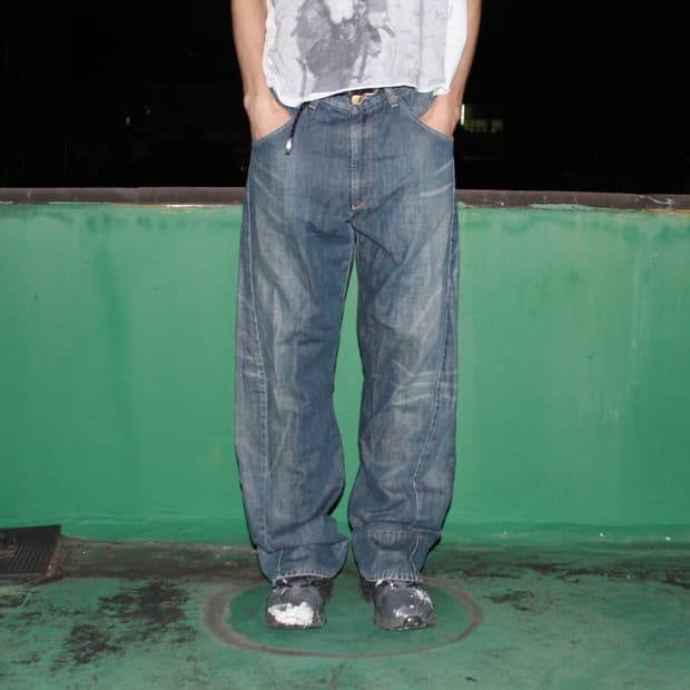 Slanted Hem Washing Denim Pants