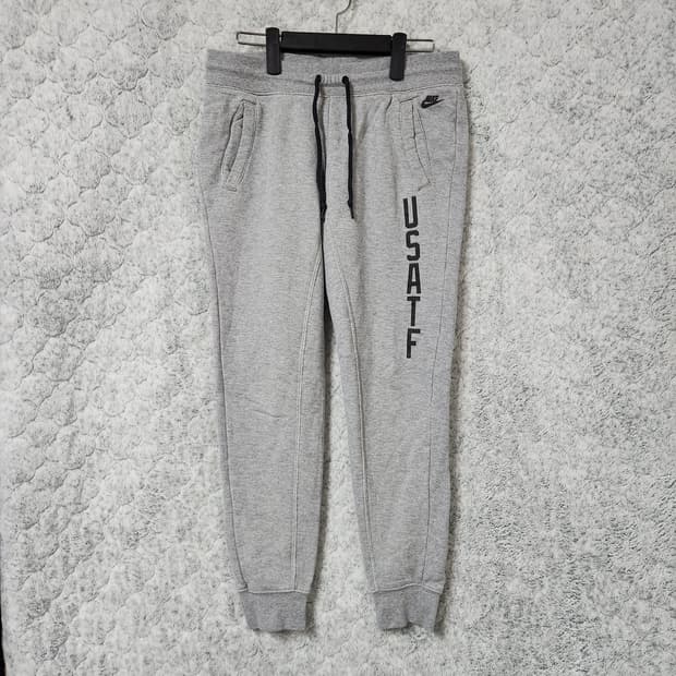 H344 [M] 나이키 USATF 여성 조거 바지
