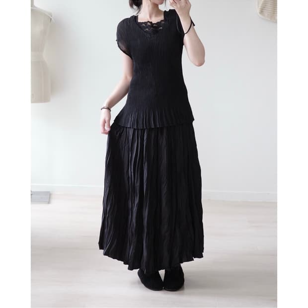 Sheer black accordion pleat sleeveless