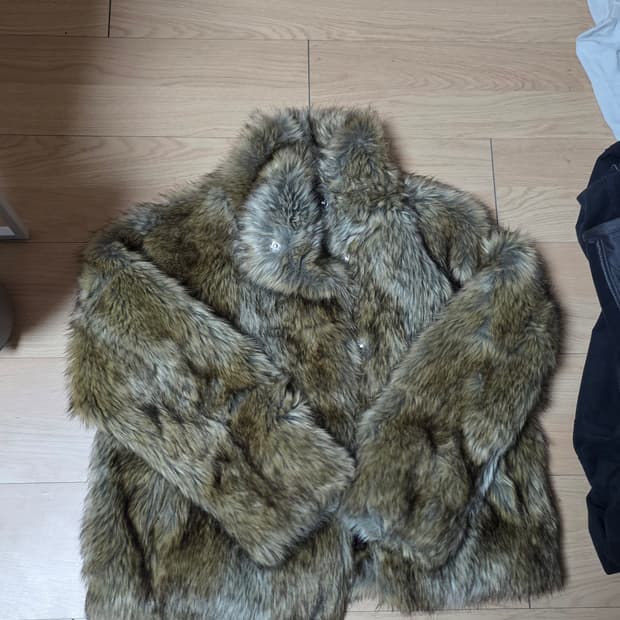 The cooples 더쿠플스 하이넥퍼자켓