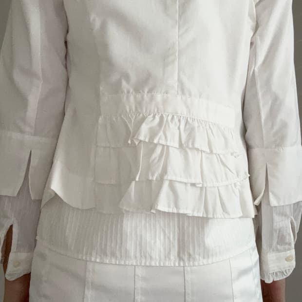 white jacket, back ruffle detail