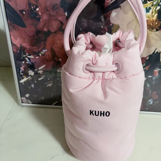 구호 패딩 버킷백