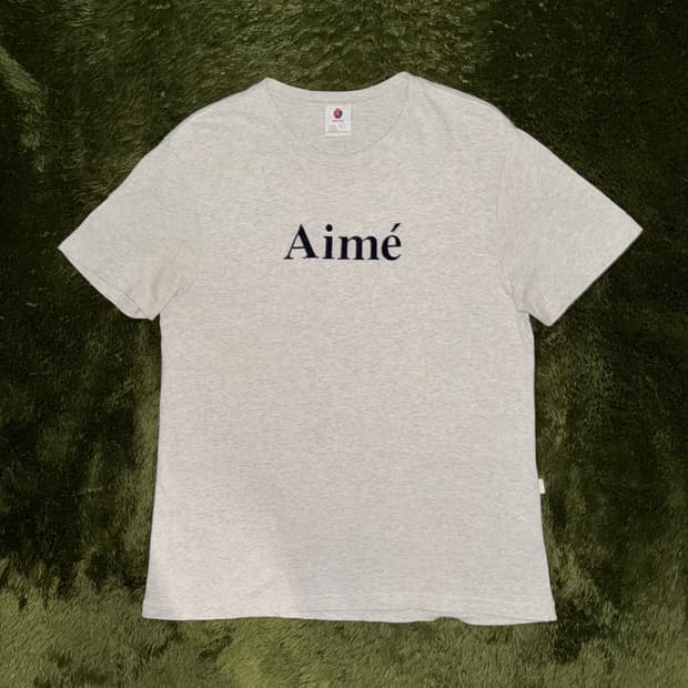 [L] 에임 레온 도르 텍스쳐드 로고 싱글 스티치 티셔츠 메란지 그레이