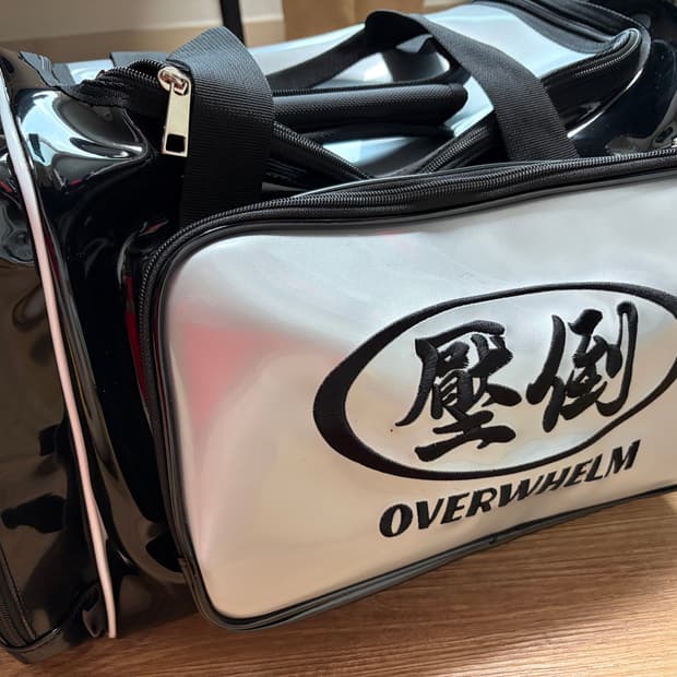 압도 overwhelm 가방 더플백 블랙실버