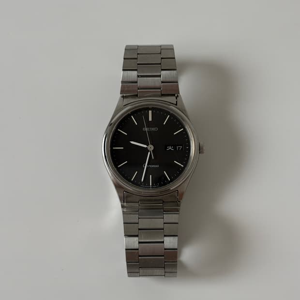 1980s Chronos Black Dial Silver Quartz