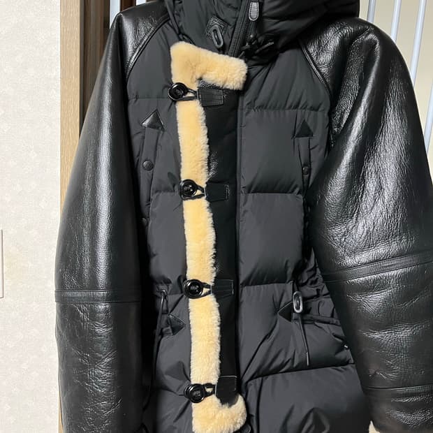 이스트로그 무스탕 패딩 