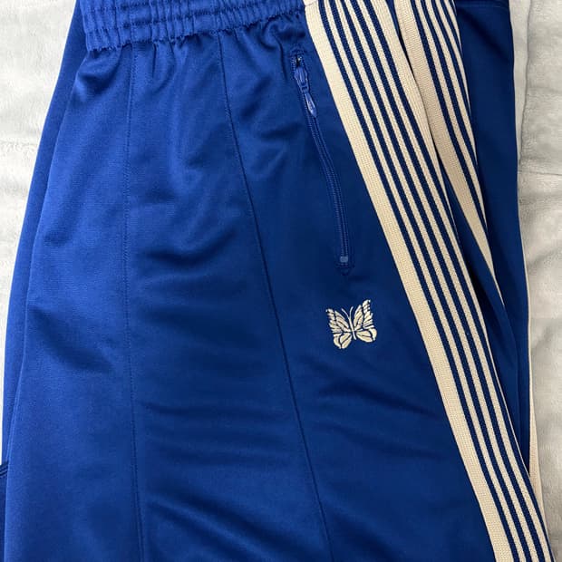 니들스 HD 트랙팬츠 로얄