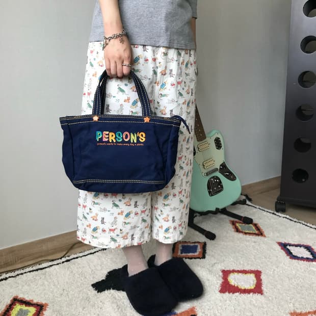 person’s tote bag..