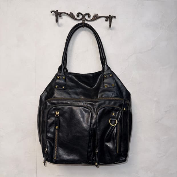 Black multi pocket stud shoulder bag