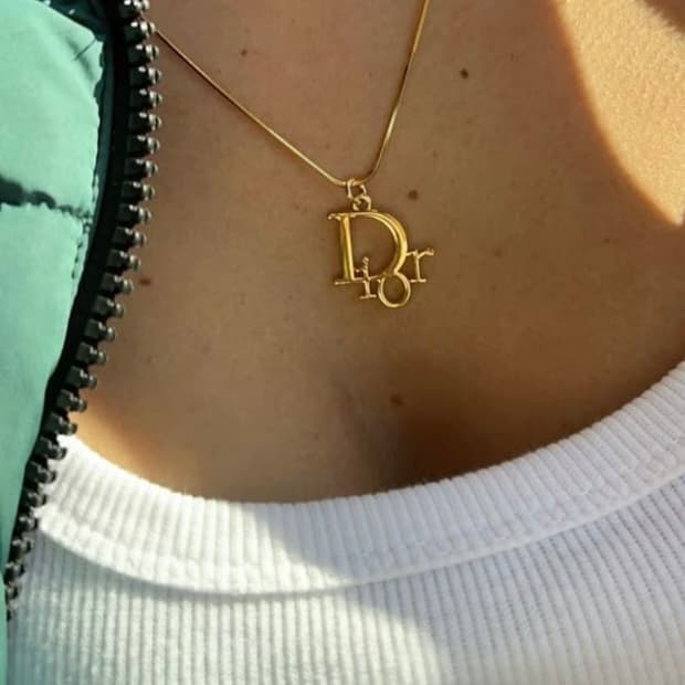 디올 스네이크 체인 오블리크 목걸이