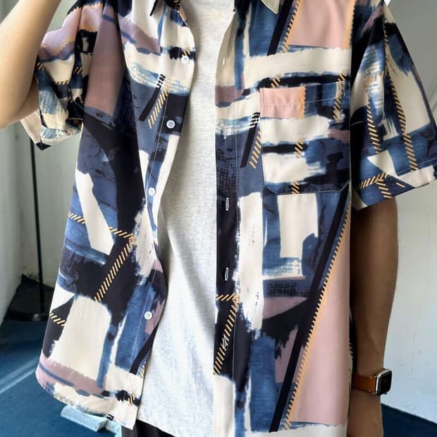 Irregularity patterned sheer shirt top
