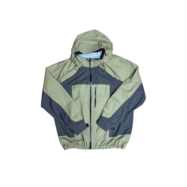 스투시 테입드 심 레인 쉘 자켓 모스