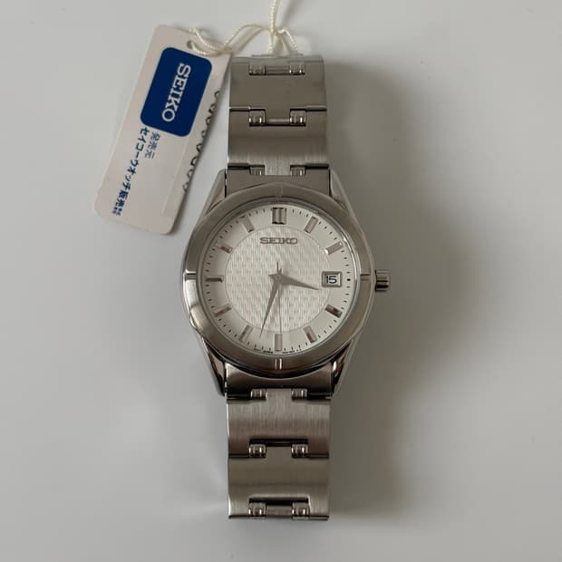 1990s White Dial Silver Quartz