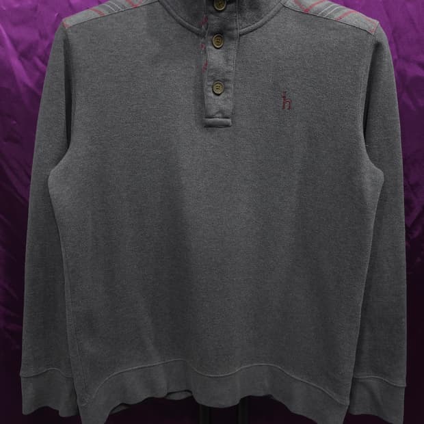 헤지스 숄더체크 하프넥 버튼 니트 티 100