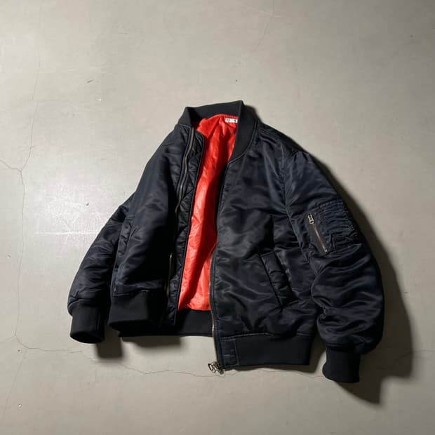 파세타즘 Face Graphic Padded Jumper