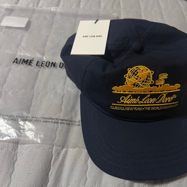 새상품)에임레온도르 유니스피어 캡 네이비 팝니다