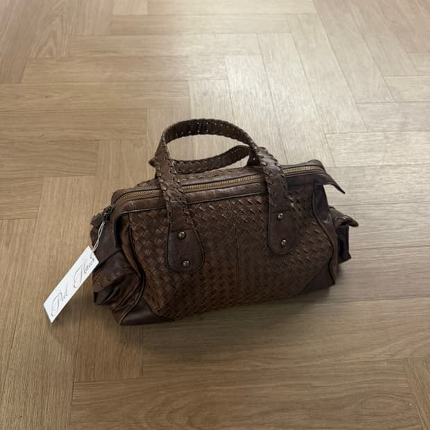 aged leather weave bag